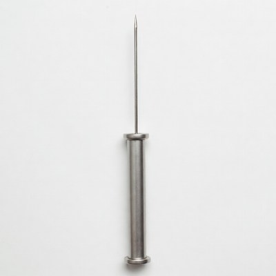 Metal Needle on White Background