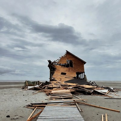 Destroyed Wooden House on Beach