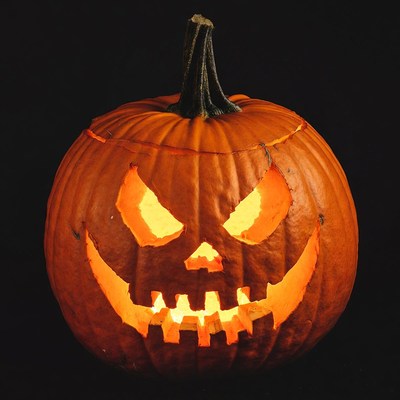 Jack-o'-lantern pumpkin on black background