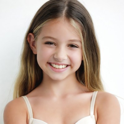 Smiling girl with blonde hair