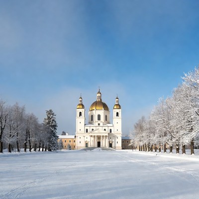 White Orthodox Church in Snowy Landscape