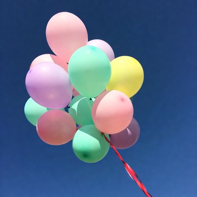 Colorful Balloons Cluster on Blue Sky