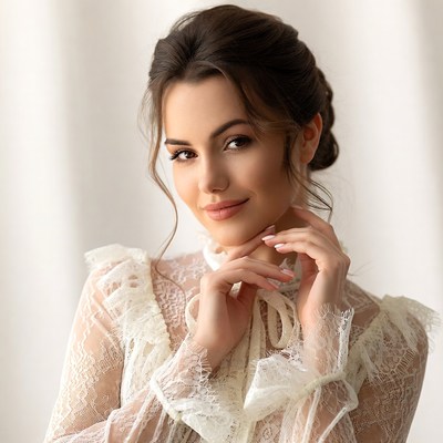 Woman in white lace blouse