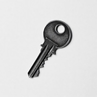 Black metal key isolated