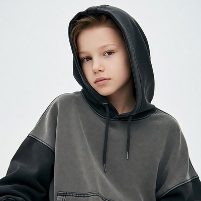 Teen boy in black hoodie