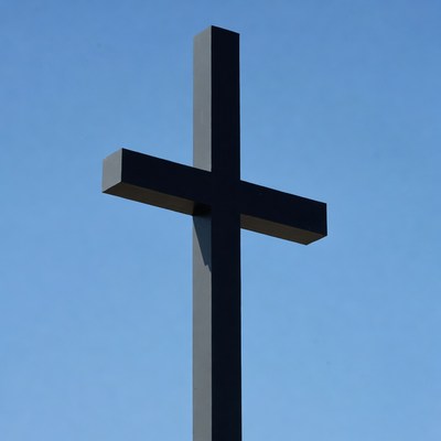Black Cross Against Blue Sky
