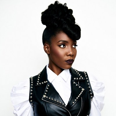 African-American woman in leather vest