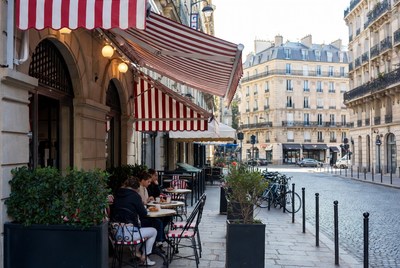 Woman at Paris Cafe Street Terrace