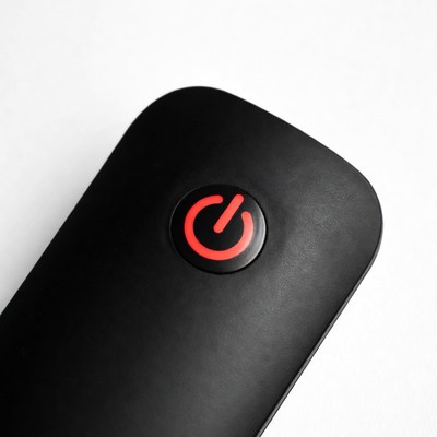 Black remote power button on