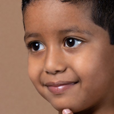 Smiling Indian boy close-up portrait