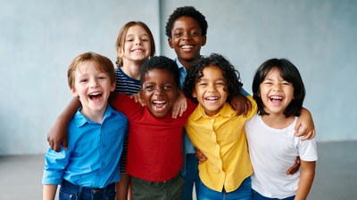 Group of diverse children laughing together