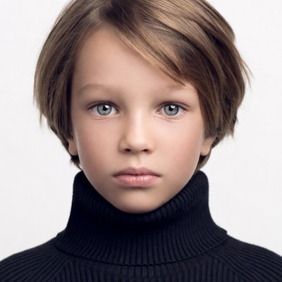 Boy in black turtleneck sweater