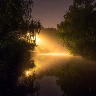 Foggy River at Night with Golden Light