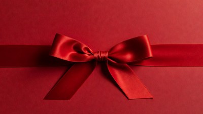 Red satin gift bow