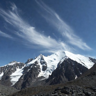 Snowy Mountain Peak with Clouds