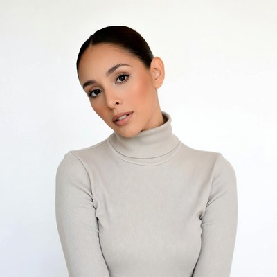 Latina woman in turtleneck portrait