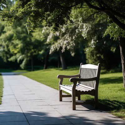 Wooden bench on park path