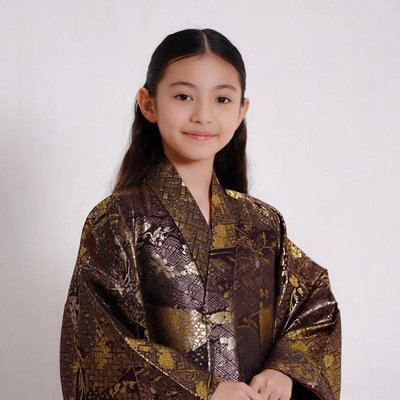 Asian girl in gold kimono
