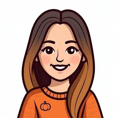 Smiling woman in orange sweater with pumpkin