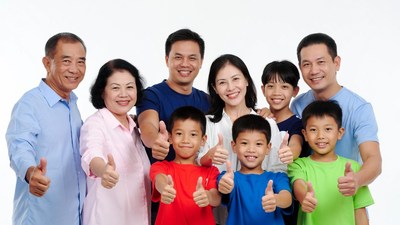 Asian family giving thumbs up