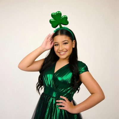 Latina girl in green shamrock headband