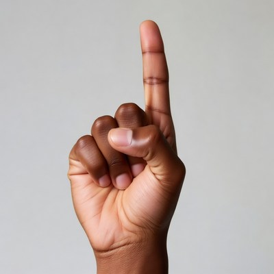 Black hand pointing up finger