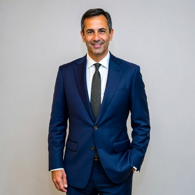 Smiling man in navy suit