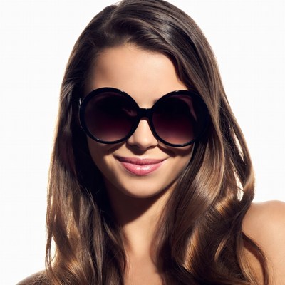 Woman wearing large sunglasses