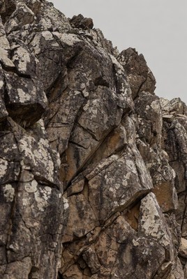 Rugged Gray Rock Cliff Face