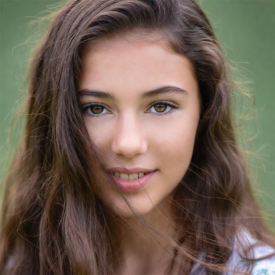 Beautiful young woman with green eyes