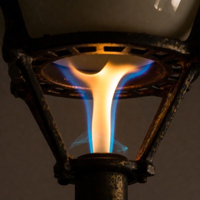 Vintage Gas Lamp Burning Flame