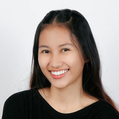 Smiling Asian girl with pigtails