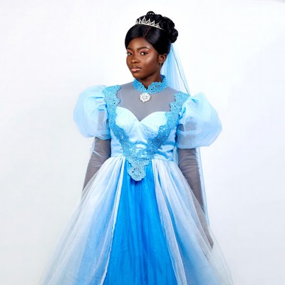 African-American woman in blue princess gown