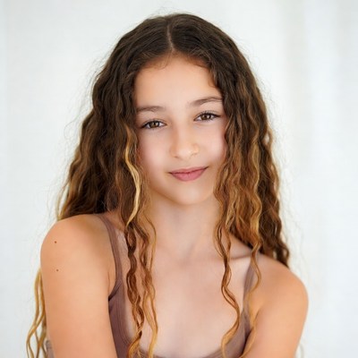 Girl with curly brown hair