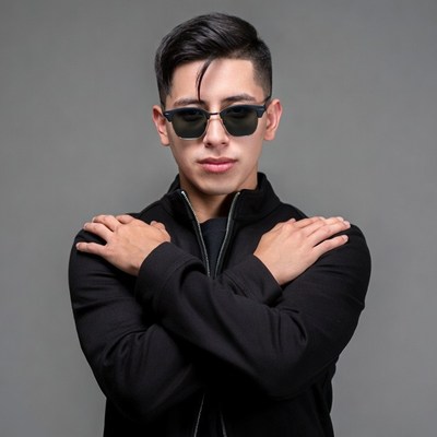 Latino man with arms crossed