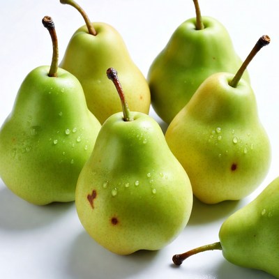 Fresh green pears on white background