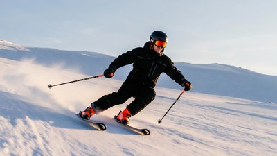 Man skiing down snowy slope