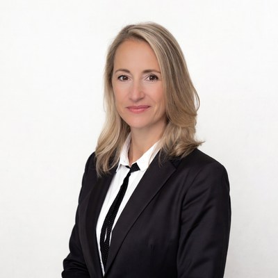 Blonde woman in black suit