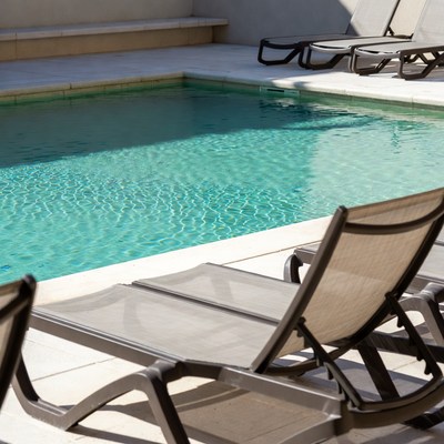 Swimming Pool with Lounge Chairs