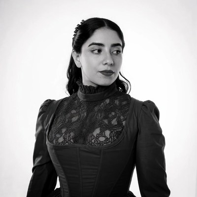 Woman in black lace Victorian dress