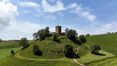 Medieval Tower on Grassy Hill