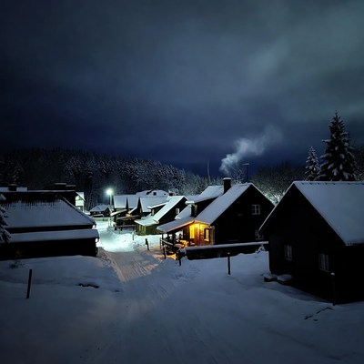 Snowy Mountain Village at Night