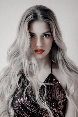 Woman with platinum blonde hair and red lips