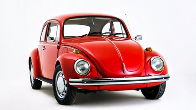 Red Volkswagen Beetle on white background