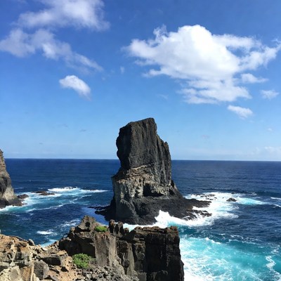 Tall Volcanic Rock Sea Stack Cliff