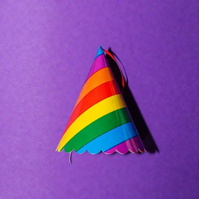 Rainbow Party Hat on Purple Background