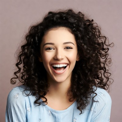 Smiling woman with curly hair