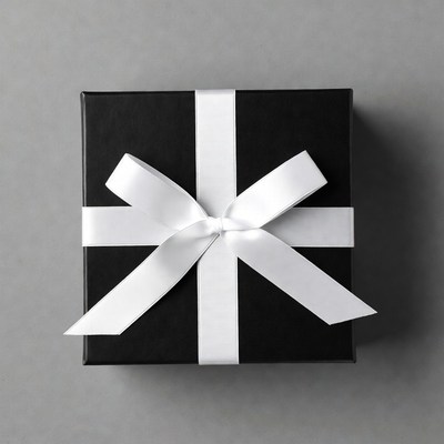 Black gift box with white ribbon