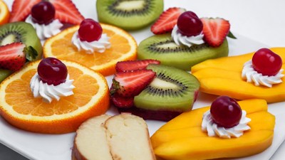Fruit Platter with Whipped Cream and Cherries