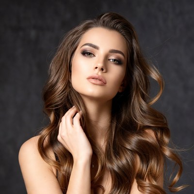 Beautiful woman with long wavy brown hair